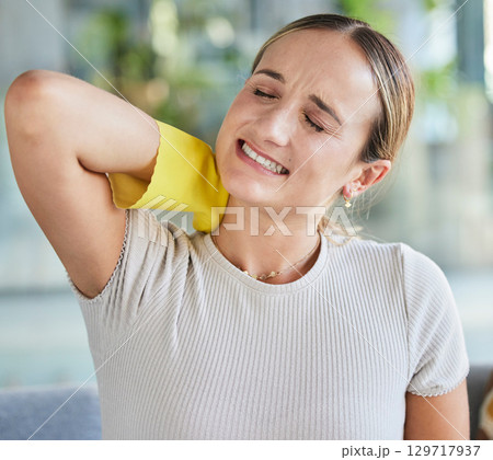 Cleaning, housekeeping and woman with neck pain tired with rubber gloves for housework and domestic chores. Burnout, suffering and housewife with body pain, ache and tension from spring cleaning home Cleaning, housekeeping and woman with neck pain tired with rubber gloves for housework and domestic chores. Burnout, suffering and housewife with body pain, ache and tension from spring cleaning home 129717937