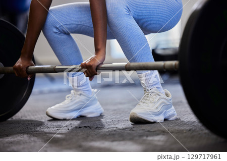 Fitness, woman hands and barbell for weightlifting, workout and exercise in gym for wellness, health and power. Strong female, bodybuilder and hard work for muscle development, challenge and training 129717961