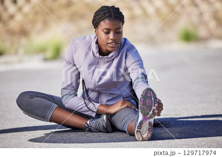 Black woman, fitness and leg stretching in city streets, daily jogging and morning workout training practice. Physical activity, healthy wellness warmup and exercise, sports in road outdoor with girl 129717974