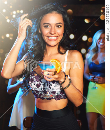Woman, party and cocktail drink at nightclub, holiday celebration and new year portrait, happy ladies night and social. Celebrate, alcohol and drinking at club with happy hour and fruit cocktails 129718190