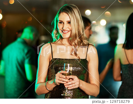 Party, event and woman with champagne at nightclub, having fun or drinking. Celebration, clubbing and happy female holding cocktail celebrating new year, partying or enjoying time at social gathering Party, event and woman with champagne at nightclub, having fun or drinking. Celebration, clubbing and happy female holding cocktail celebrating new year, partying or enjoying time at social gathering 129718279