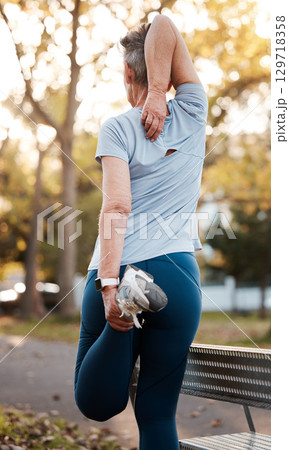 Back, senior woman and stretching outdoor for workout, wellness and health. Exercise, mature female or elderly lady training, fitness and practice for balance, cardio and performance for retirement. Back, senior woman and stretching outdoor for workout, wellness and health. Exercise, mature female or elderly lady training, fitness and practice for balance, cardio and performance for retirement. 129718358