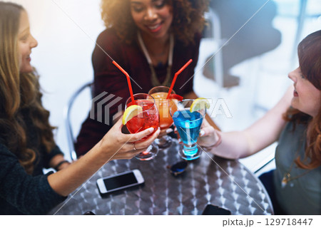Friends with cocktail, toast at club for happy hour, women together for celebration and ladies night with event and alcohol drinks. Happy, fun and female group having cocktails with social gathering. 129718447