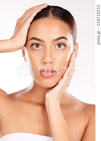 Face, cosmetics and woman with skincare, happy and smooth or clear skin on studio background. Makeup, confident female and healthy girl for natural beauty, wellness and organic facial to relax. Face, cosmetics and woman with skincare, happy and smooth or clear skin on studio background. Makeup, confident female and healthy girl for natural beauty, wellness and organic facial to relax. 129718552