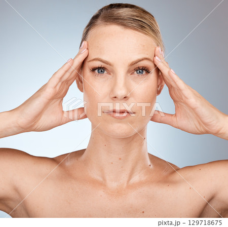 Beauty, skincare and portrait of woman in studio on gray background for wellness, facial treatment and spa. Dermatology, aesthetic and girl with hands on face for cosmetics, healthy and natural skin 129718675