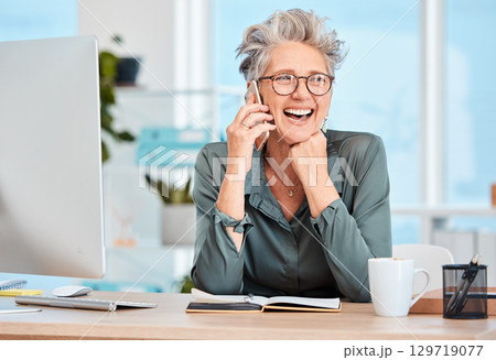 Phone call, office and senior business woman planning strategy, project or proposal in book. Happy, smile and elderly professional manager on mobile conversation while working on management report. 129719077