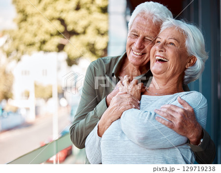 Senior man embracing his wife with love, happiness and care in the backyard of their home in Canada. Happy, smile and elderly couple hugging, laughing and bonding in outdoor garden at their house. 129719238