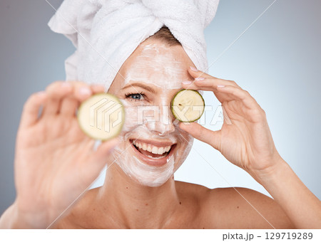 face mask, cucumber and smile for woman skincare beauty wellness, salon spa care or skin health portrait in studio. Luxury facial care, happy dermatology and natural skin therapy or healthy detox 129719289