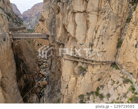 Caminito del Rey walking trail, Kings little pathway, Aerial Drone views of El Chorro Gorge, Ardales, Malaga, Spain. 129719503