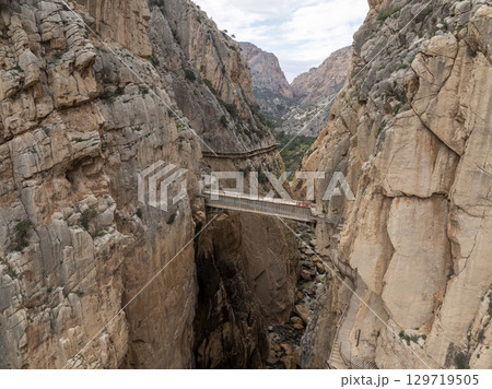 Caminito del Rey walking trail, Kings little pathway, Aerial Drone views of El Chorro Gorge, Ardales, Malaga, Spain. Caminito del Rey walking trail, Kings little pathway, Aerial Drone views of El Chorro Gorge, Ardales, Malaga, Spain. 129719505