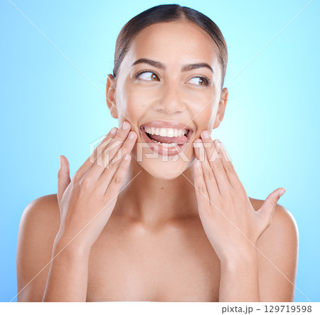 Face, hands and woman tongue for skincare beauty wellness, luxury spa dermatology or natural cosmetics makeup. Facial care, self care body glow and happiness for skin or body care in blue studio 129719598