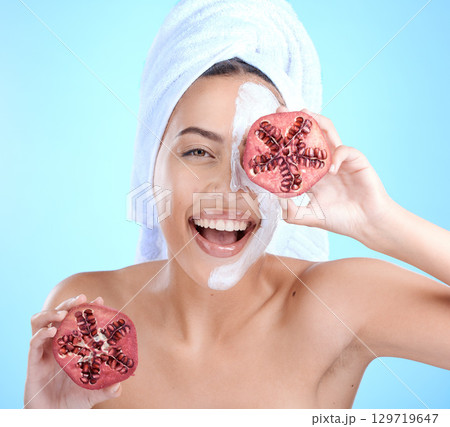 Woman, face mask and pomegranate for spa beauty, luxury skincare wellness and natural skin glow portrait in studio. .Model, happiness smile and facial dermatology or fruit cosmetics body nutrition Woman, face mask and pomegranate for spa beauty, luxury skincare wellness and natural skin glow portrait in studio. .Model, happiness smile and facial dermatology or fruit cosmetics body nutrition 129719647