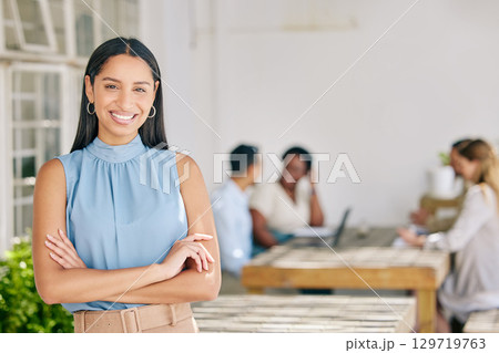 Portrait of a creative woman working in an outdoor garden with a team on a business project. Happy, professional and corporate leader standing outside the company office doing teamwork with workers. 129719763