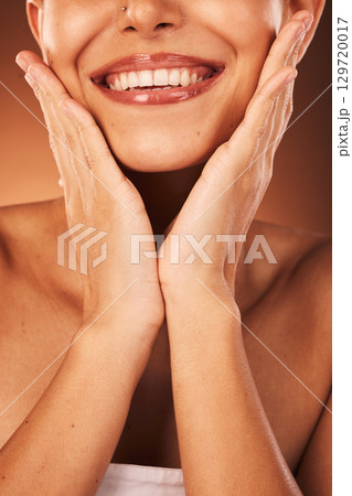 Lips, teeth and beauty woman in studio for cosmetics, makeup and dental or dentist promotion of wellness, skincare and health. Happy mouth, smile and teeth whitening results or lip filler of a model 129720017