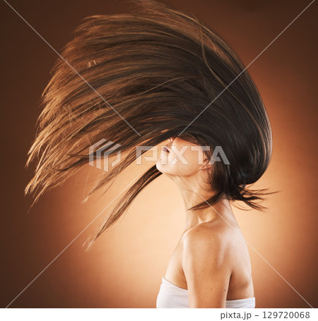 Beauty, hair care and flip profile with a model on gradient background for cosmetics, transformation and shampoo for growth and shine. Model in studio for freedom, beauty salon and hairdresser 129720068