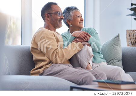 Elderly couple, relax and smile watching tv, movie or streaming on sofa together at home. Senior man and woman relaxing on living room couch enjoying online shows, media or entertainment indoors Elderly couple, relax and smile watching tv, movie or streaming on sofa together at home. Senior man and woman relaxing on living room couch enjoying online shows, media or entertainment indoors 129720077