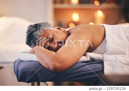 Spa sleeping, relax and senior woman on holiday, luxury massage and body therapy at a hotel. Sleep wellness, retirement cosmetics and elderly person with care for skin, peace and calm on vacation 129720126