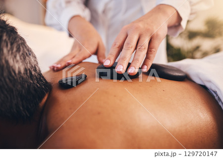 Hands, stone massage and relax therapy for skincare beauty or calm spa wellness. Physical therapy, luxury zen healthcare and hot rock healing or natural body detox in beauty salon for stress relief 129720147