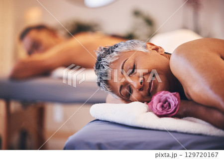 Relax, couple and massage at a spa for senior people on a table for wellness, zen and skincare treatment. Peace, luxury and senior woman happy with flower, aromatherapy and relaxation in Thailand 129720167