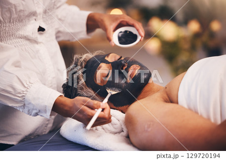 Senior woman, charcoal face mask and at spa to relax, clear and smooth skin. Luxury, mature female and black paste for organic facial detox, natural beauty and wellness for peace, calm and skincare. Senior woman, charcoal face mask and at spa to relax, clear and smooth skin. Luxury, mature female and black paste for organic facial detox, natural beauty and wellness for peace, calm and skincare. 129720194