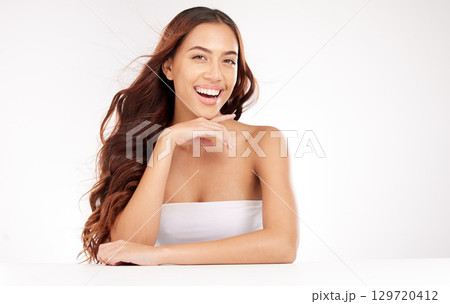 Hair, skincare and studio woman in portrait for beauty salon, cosmetics and natural makeup marketing, advertising and promotion mockup. Happy woman model with haircare, smile on face and dermatology Hair, skincare and studio woman in portrait for beauty salon, cosmetics and natural makeup marketing, advertising and promotion mockup. Happy woman model with haircare, smile on face and dermatology 129720412