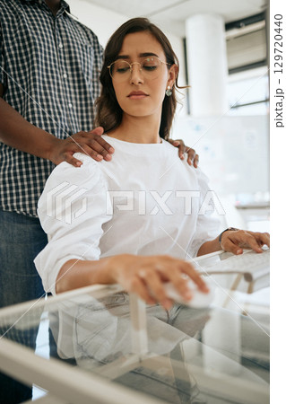 Sexual harassment, scared and confused woman in office uncomfortable working with coworker. Abuse, anxiety and stress of receptionist girl at desk nervous for flirting touch of man colleague. 129720440