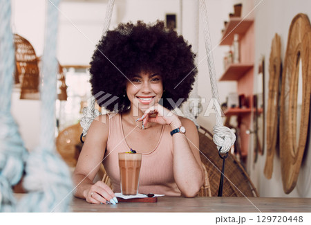 Black woman in coffee shop portrait with drink, relax with natural hair and smile, happy alone for self care date and pride with afro for self love. Happiness, African woman in cafe for coffee break. 129720448