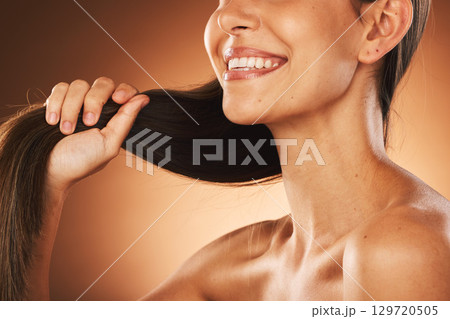 Hair, smile and woman hands for hair care beauty, salon spa or luxury cosmetics care in studio. Hairstyle growth, clean haircare wellness or happy model promote product and natural keratin shine 129720505