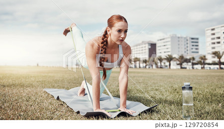 Woman, stretching legs and resistance band in the city for workout, exercise or training on yoga mat. Female yogi in warm up leg stretch and elastic strap for healthy wellness or fitness in Cape Town Woman, stretching legs and resistance band in the city for workout, exercise or training on yoga mat. Female yogi in warm up leg stretch and elastic strap for healthy wellness or fitness in Cape Town 129720854