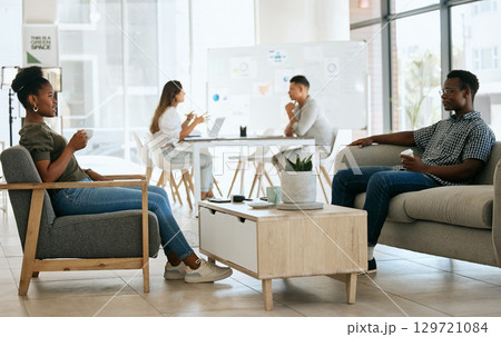 Business people, interview and recruitment with hr, waiting and talking in office for job seeker and employment company. Black man and woman talking in office while waiting for hiring manager at work 129721084