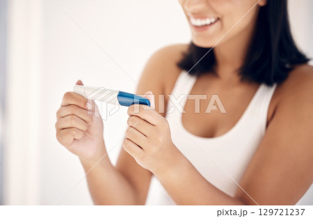 Good news, smile and woman with pregnancy test in bathroom happy, excited and celebrate positive results. Fertility, love and pregnant woman ready for motherhood and future children, family and baby Good news, smile and woman with pregnancy test in bathroom happy, excited and celebrate positive results. Fertility, love and pregnant woman ready for motherhood and future children, family and baby 129721237