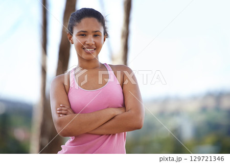 Young woman, portrait and runner, arms crossed for fitness workout in nature park, exercise wellness and body healthcare or cardio training. Athlete person, running motivation and happy outdoor Young woman, portrait and runner, arms crossed for fitness workout in nature park, exercise wellness and body healthcare or cardio training. Athlete person, running motivation and happy outdoor 129721346