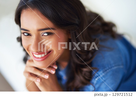 Woman, face and happy to relax portrait on sofa in home for happiness or relaxing lifestyle. Young person, smile and mental health wellbeing or smiling for couch relaxation or positive thinking Woman, face and happy to relax portrait on sofa in home for happiness or relaxing lifestyle. Young person, smile and mental health wellbeing or smiling for couch relaxation or positive thinking 129721512
