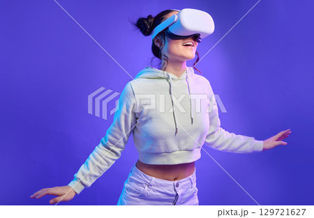 Future of ai, woman with vr headset and digital transformation for metaverse experience in technology. Person streaming augmented reality simulation, futuristic gaming and ux for cyber innovation Future of ai, woman with vr headset and digital transformation for metaverse experience in technology. Person streaming augmented reality simulation, futuristic gaming and ux for cyber innovation 129721627