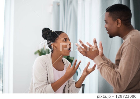 Divorce, angry or black couple fight about money loan, mortgage debt or financial problems at home in Nigeria. Anger, communication and stressed black woman shouting at a frustrated African partner Divorce, angry or black couple fight about money loan, mortgage debt or financial problems at home in Nigeria. Anger, communication and stressed black woman shouting at a frustrated African partner 129722080