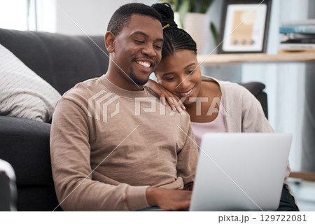 Relax, laptop and couple on floor for internet, search and social media entertainment in their home. Love, black family and woman with man reading online news, post or streaming show in living room Relax, laptop and couple on floor for internet, search and social media entertainment in their home. Love, black family and woman with man reading online news, post or streaming show in living room 129722081