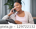 Happy, phone call and black woman on home sofa with internet connection, communication and smile. Relax, conversation and happiness of girl in South African house with smartphone connectivity. 129722132