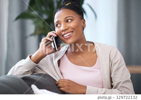 Happy, phone call and black woman on home sofa with internet connection, communication and smile. Relax, conversation and happiness of girl in South African house with smartphone connectivity. Happy, phone call and black woman on home sofa with internet connection, communication and smile. Relax, conversation and happiness of girl in South African house with smartphone connectivity. 129722132
