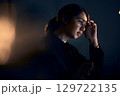 Burnout, stress and business woman at night working on computer for project, report and strategy deadline. Thinking, mental health and female worker in dark office frustrated, tired and overworked 129722135