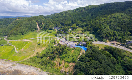 白米千枚田と隆起した海岸線　令和6年能登半島地震と豪雨被害から修復が進む白米千枚田　空撮 129723496