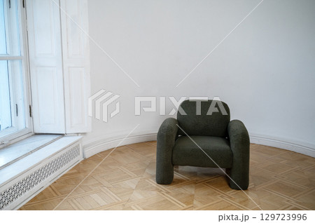 A chair sitting in a room A chair sitting in a room 129723996