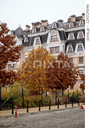 bright autumn in a residential area 129724046