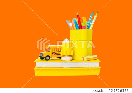 Yellow-themed school supplies ready for the semester Yellow-themed school supplies ready for the semester 129726578
