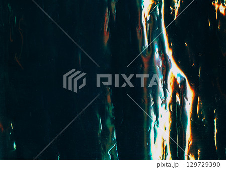 Display failure texture. Glitch effect surface. Glossy metal glare scratched abstract black background. Colorful distressed old sheet free space. Display failure texture. Glitch effect surface. Glossy metal glare scratched abstract black background. Colorful distressed old sheet free space. 129729390
