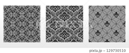 Geometric floral set of seamless patterns. Gray and black vector backgrounds. Damask graphic ornaments Geometric floral set of seamless patterns. Gray and black vector backgrounds. Damask graphic ornaments 129730510