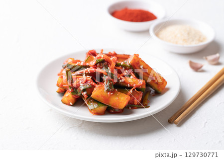 Korean kimchi cucumber on white background, Korean side dish, Homemade food Korean kimchi cucumber on white background, Korean side dish, Homemade food 129730771