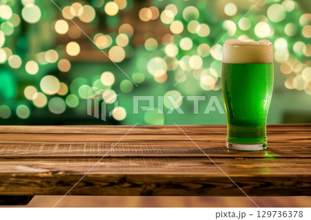 Glass of green beer on table, st patricks day concept. Ai generative 129736378