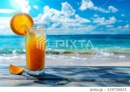 A glass of orange juice with a straw in it is sitting on a table by the ocean.ai generative A glass of orange juice with a straw in it is sitting on a table by the ocean.ai generative 129736625