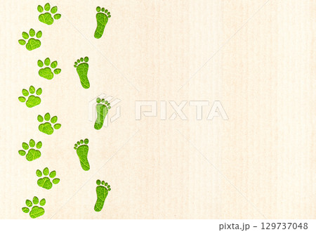 Let's save wildlife together. Banner with eco paper texture, animal paws print and human footprint in paper cut style and green leaf. Zero waste, responsible consumption, reuse, eco-friendly concept Let's save wildlife together. Banner with eco paper texture, animal paws print and human footprint in paper cut style and green leaf. Zero waste, responsible consumption, reuse, eco-friendly concept 129737048