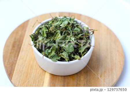 Dried gotu kola herb with leaves, stems, and roots Dried gotu kola herb with leaves, stems, and roots 129737650